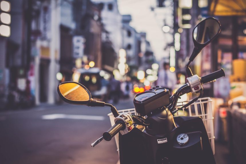 Image showing a parked scooter. (Photo Credit: Igor Ovsyannykov from Pixabay).